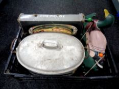 A crate of aluminium cooking pot, boxed set of oval dishes, wooden duck, coat rack,