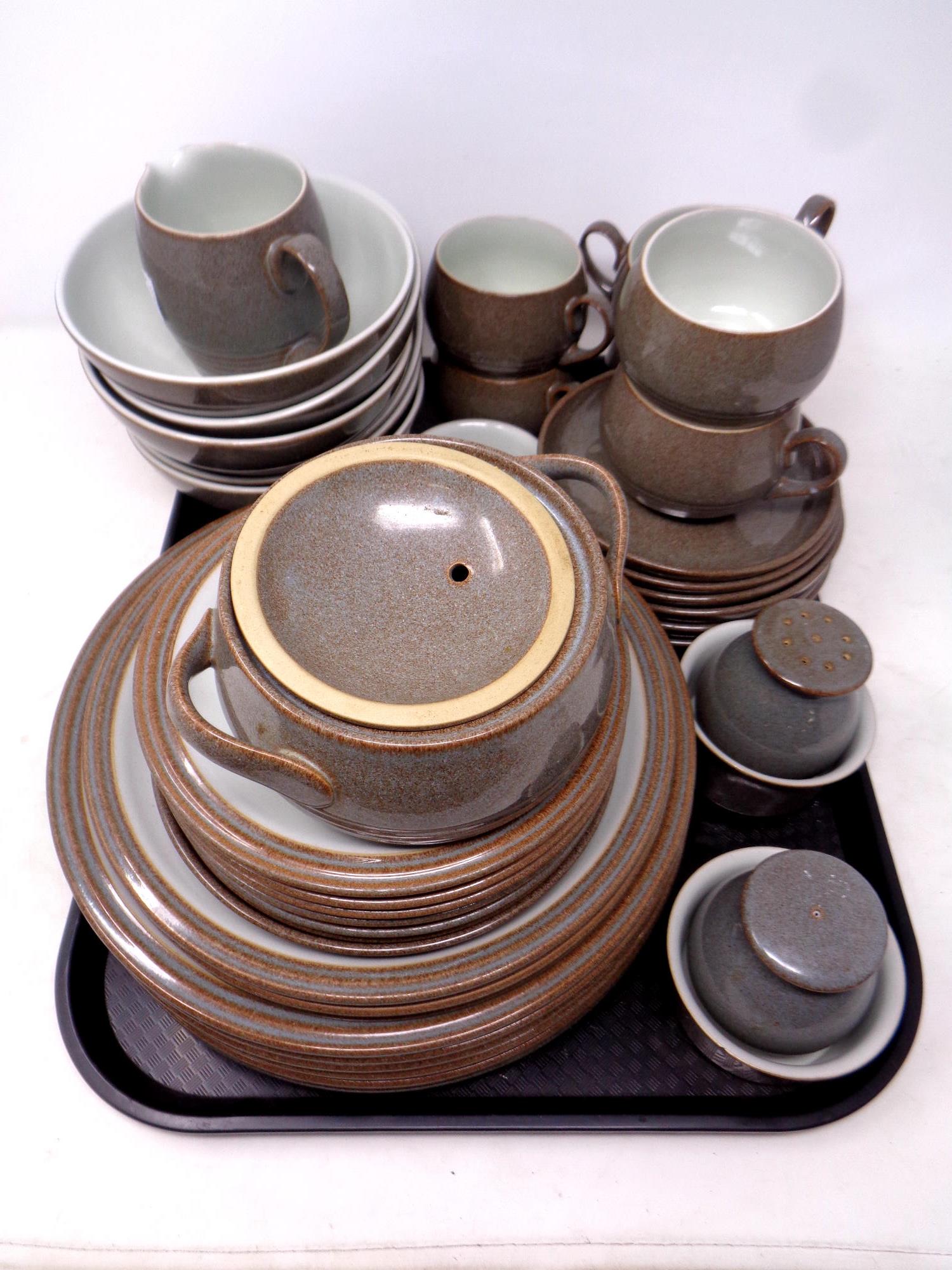 A tray of forty-one pieces of Denby tea and dinner ware