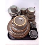 A tray of forty-one pieces of Denby tea and dinner ware