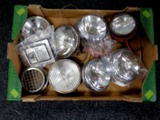 A box containing a quantity of vintage head lamps