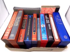 A box containing twelve Folio Society volumes to include The Earth: An Intimate History,