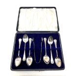 A set of six cased silver teaspoons and tongs, Birmingham marks CONDITION REPORT: 58.