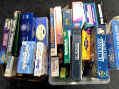 A box and a crate containing a large quantity of board games to include Scrabble, Monopoly,