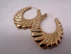 A pair of gold plated earrings