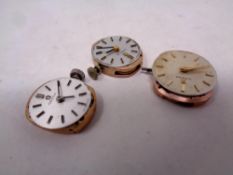 Three watch movements,