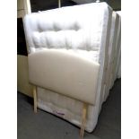 A 4'6 storage divan set with Perfecta Back Care firm mattress