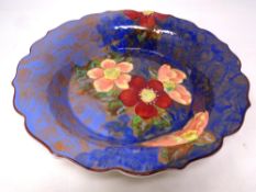 A Royal Doulton shaped shallow dish decorated with flowers,