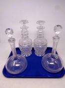 A pair of lead crystal cut glass decanters together with a further pair of liqueur decanters