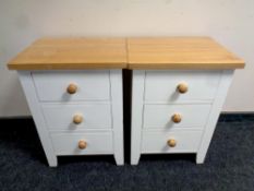 A pair of contemporary three drawer bedside chests