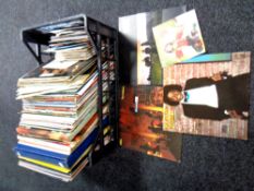 A crate containing large quantity of vinyl LPs, LP box sets and 45s to include Michael Jackson,