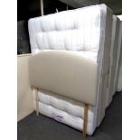 A 4'6 storage divan set with Perfecta Back Care firm mattress