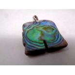 A silver mother of pearl pendant