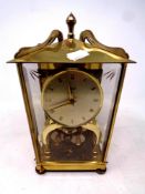 A brass cased Schatz anniversary clock