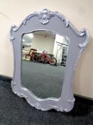 A contemporary French style painted framed mirror