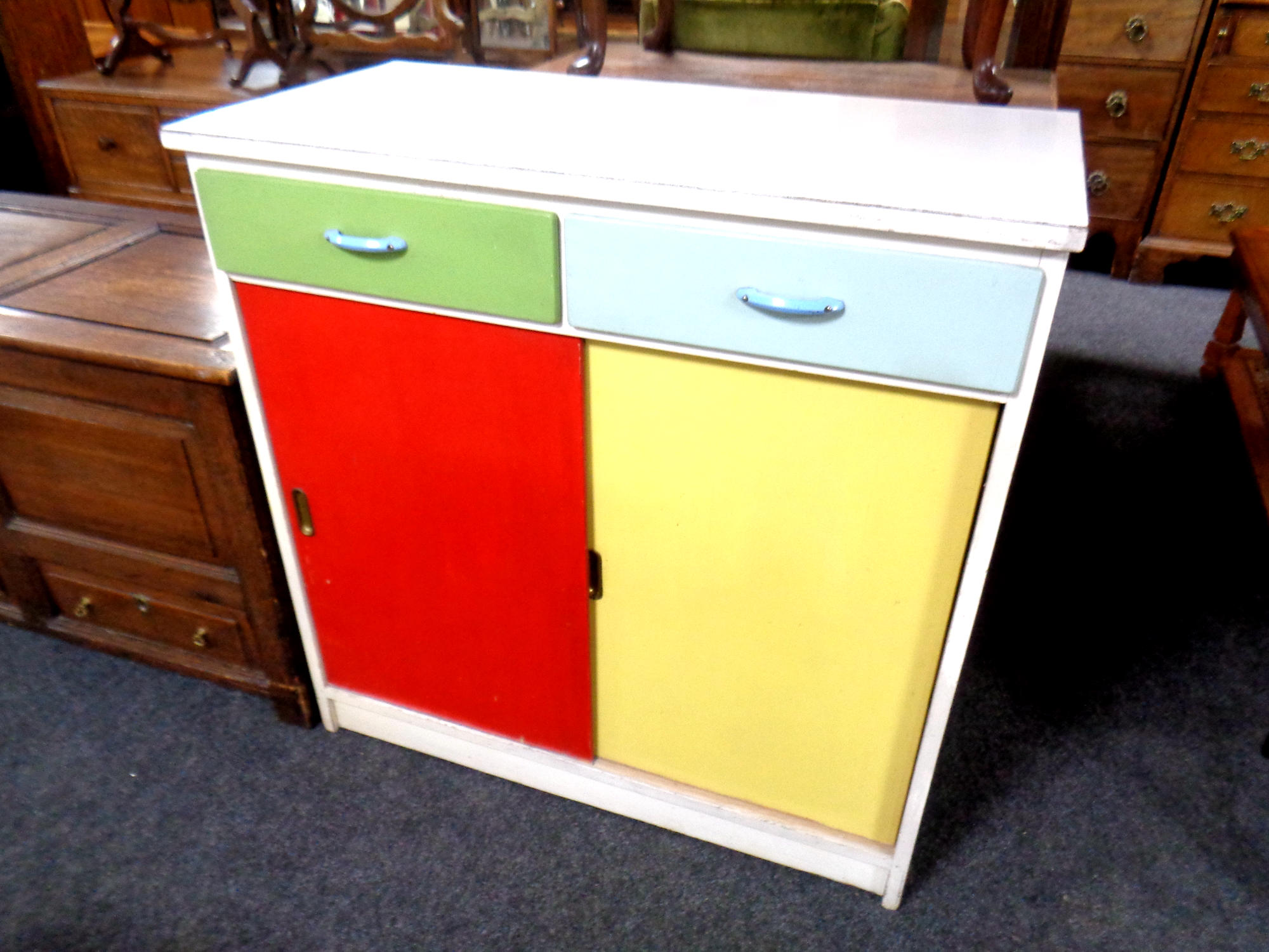 A mid 20th century melamine topped kitchen cabinet fitted two drawers above,