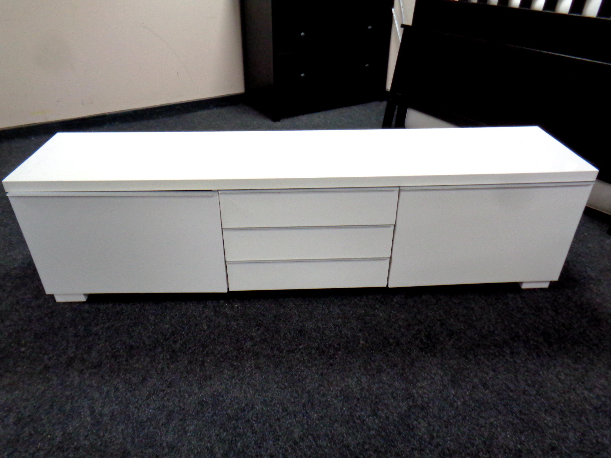 A white gloss entertainment stand,