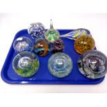 A tray containing ten assorted paperweights to include Selkirk glass,