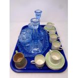 A tray containing a six piece blue glass Art Deco trinket set together with thirteen pieces of