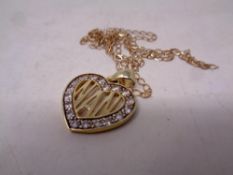 A silver and gold plated chain with pendant