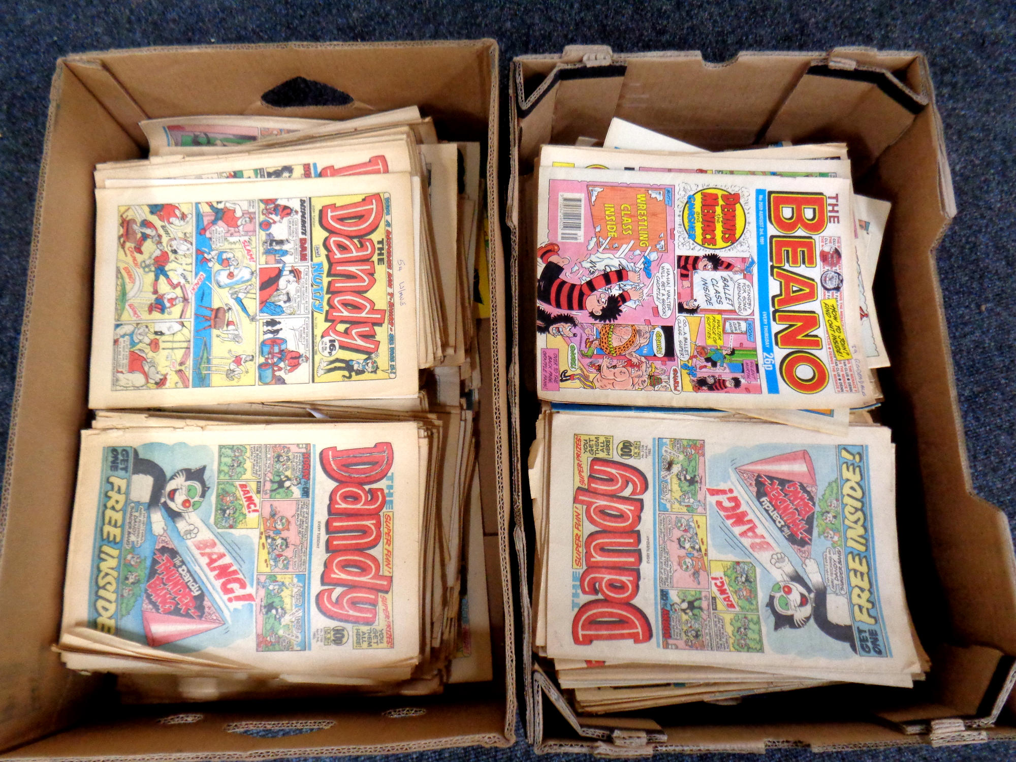 Two boxes containing a large quantity of late 20th century Dandy and Beano comics