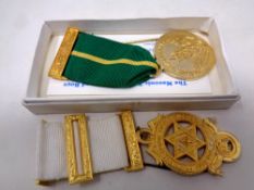 Two masonic medals in case