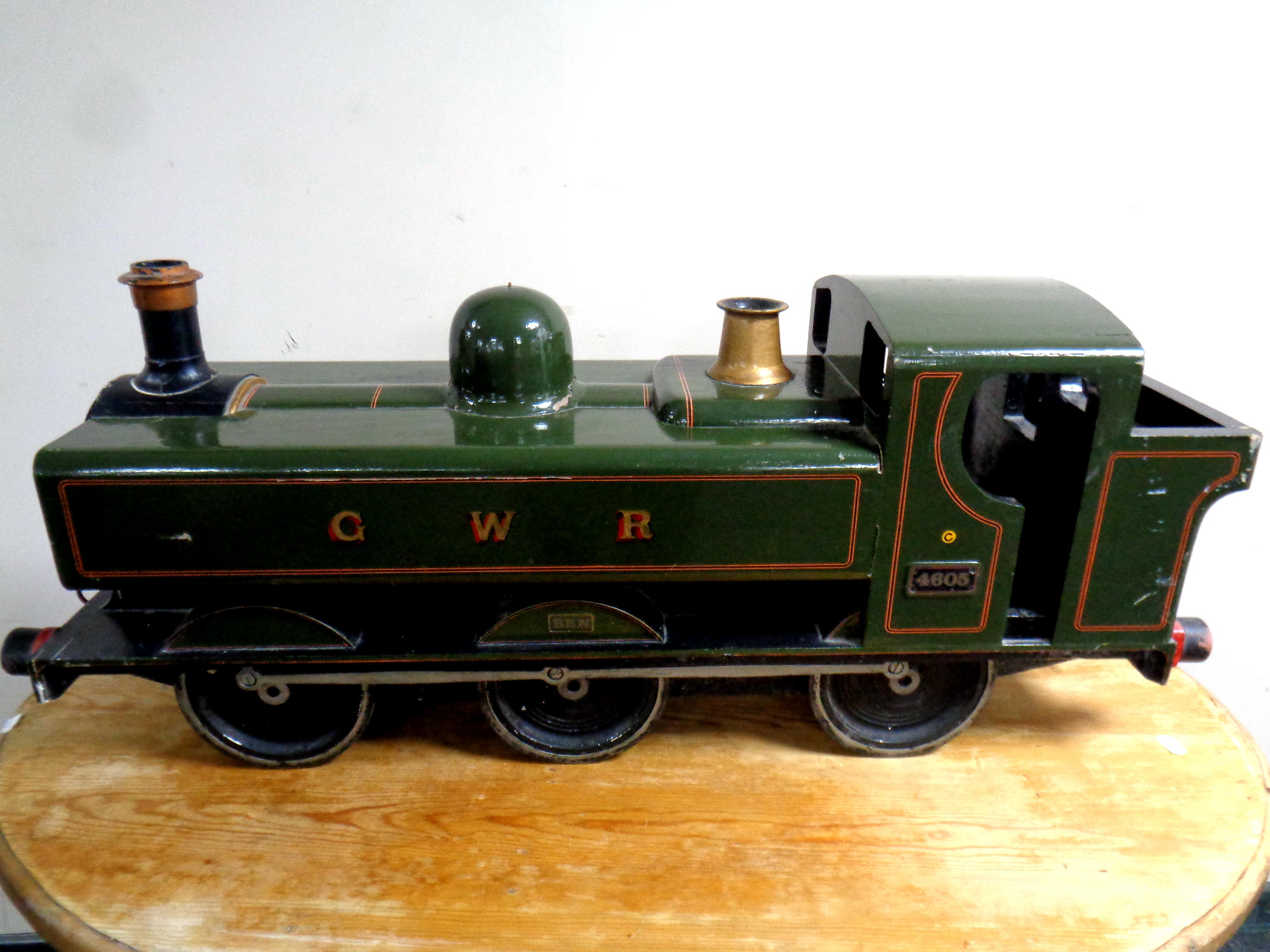A hand built wooden model of a GWR 4605 locomotive,