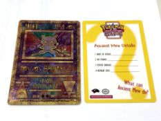 Pokemon - An original Ancient Mew holographic shiny card with details card.