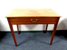 A 19th century mahogany writing table fitted a drawer,