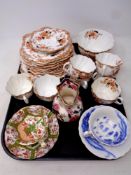 A tray containing a part 19th century tea service together with further antique china cups and