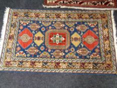 A Caucasian rug of geometric design,