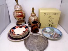 A box containing oriental style ceramics to include boxed collector's plates,