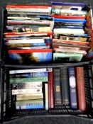 Two plastic crates containing large quantity of hardback and softback books relating to