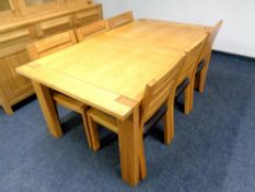 A Marks & Spencer Furniture contemporary oak extending table and six chairs