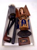 A box containing horn beaker, 19th century snuff boxes, religious figures in wooden cases,