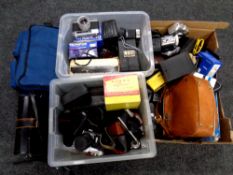 Three boxes containing a large quantity of assorted cameras,