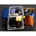 Three boxes containing a large quantity of assorted cameras,