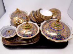 A tray containing a quantity of decorative Thai china