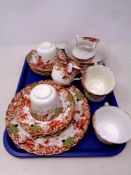 A tray containing a 21 piece antique bone china tea service