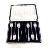 A set of six cased silver teaspoons and tongs, Sheffield marks CONDITION REPORT: 77.
