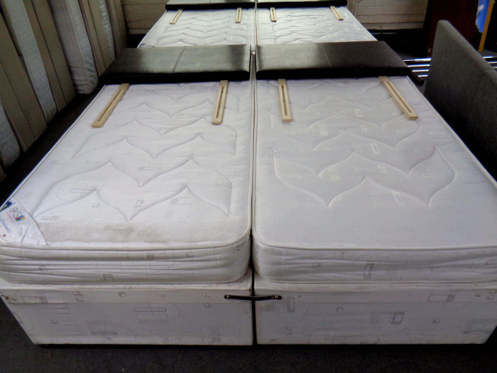 A pair of SKS Sapphire Orthopedic 3' divan sets (zipped together to make 6' bed)