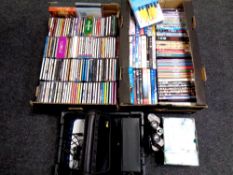 Two boxes containing DVDs, DVD box sets and CDs to include The Beatles,