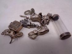A quantity of silver and white metal charms