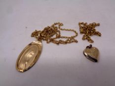 A gold plated heart locket on chain together with a further pendant