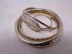 A quantity of silver and white metal bangles