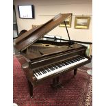 A mahogany cased baby grand piano by Chappell, width 139 cm.