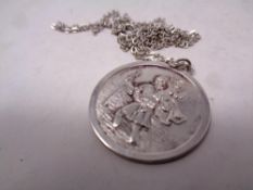 A sterling silver St Christopher pendant on chain