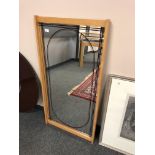 A pine framed mirror 61 cm x 117 cm
