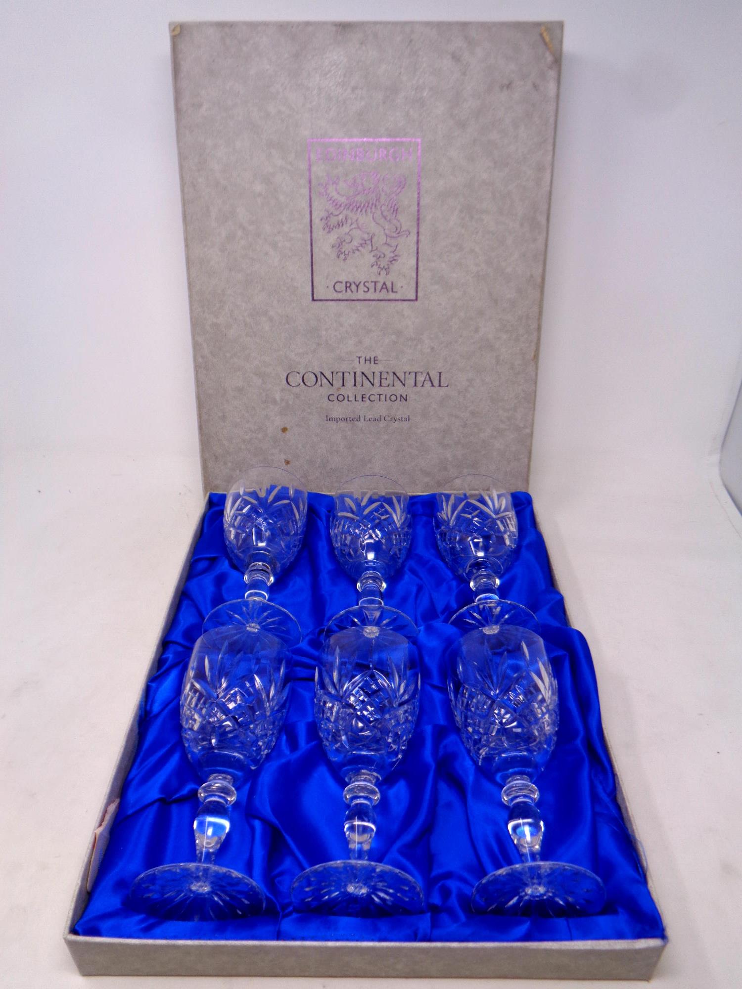 A set of six Edinburgh crystal continental collection wine glasses,