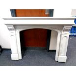 A contemporary composite fire surround