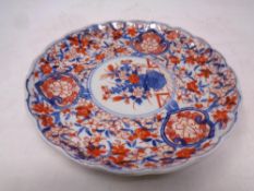 A Japanese Imari scalloped edged plate,